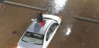 Inundación y angustia por las lluvias en Caracas: el rescate de una mujer que había quedado aislada sobre el techo de su auto